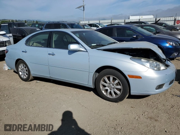 2003 Lexus ES 300 with VIN JTHBF30G530099830, listed as a Copart auction lot 52712945 with 142,874 mi miles and Salvage Title. Bid and sale history available at DreamBid. Image 4.