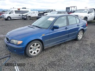 2004 BMW 3 Series 325i with VIN WBAET37414NH06040, listed as a IAAI auction lot 41793260 with 212,541 mi miles. Bid and sale history available at carsss.com. Image 2.
