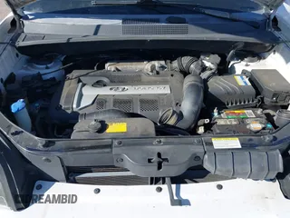 2006 Hyundai Tucson GL with VIN KM8JM72B56U324168, listed as a IAAI auction lot 42146955 with 206,919 mi miles. Bid and sale history available at carsss.com. Image 10.