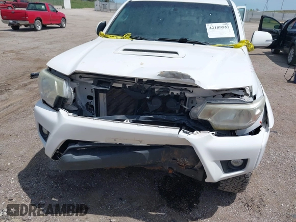 2015 Toyota Tacoma with VIN 3TMLU4EN2FM193142, listed as a IAAI auction lot 42189553 with 70,480 mi miles and . Bid and sale history available at DreamBid. Image 6.