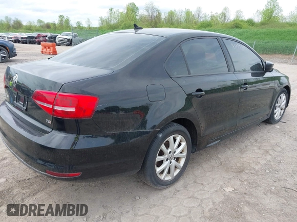 2015 Volkswagen Jetta SE z VIN 3VWD17AJ8FM321933, wystawiony jako IAAI lot #41177805 z przebiegiem 125 987 mil mil oraz . Historia ofert i sprzedaży dostępna na DreamBid. Obrazek 4.