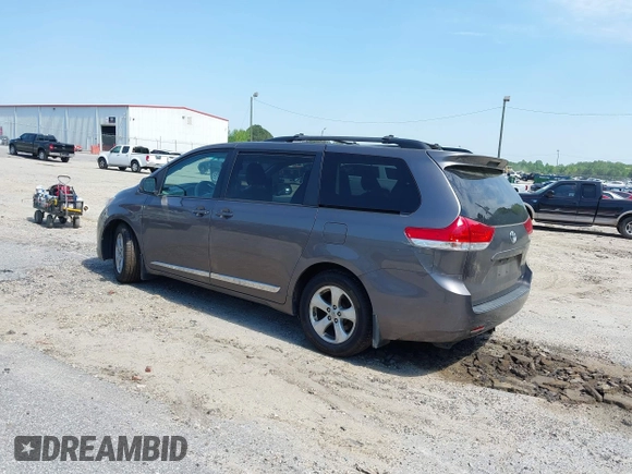 2014 Toyota Sienna LE AAS with VIN 5TDKK3DC4ES431664, listed as a IAAI auction lot 42081429 with 208,505 mi miles and . Bid and sale history available at carsss.com. Image 3.
