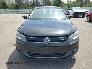 2013 Volkswagen Jetta Hybrid SE with VIN 3VW637AJXDM225219, listed as a Copart auction lot 63197905 with 97,672 mi miles and Clean title. Bid and sale history available at DreamBid. Image 5.