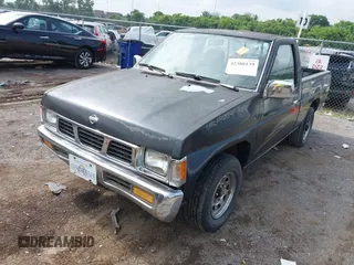 1994 Nissan Frontier z VIN 1N6SD11S2RC402971, wystawiony jako IAAI lot #42388139 z przebiegiem 122 571 mil mil oraz . Historia ofert i sprzedaży dostępna na DreamBid. Obrazek 2.