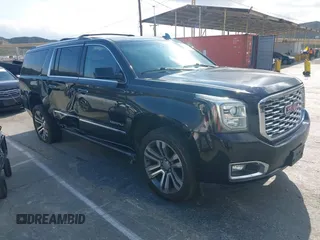 2018 GMC Yukon XL Denali with VIN 1GKS2HKJ1JR264188, listed as a IAAI auction lot 42076135 with 113,283 mi miles. Bid and sale history available at carsss.com. Image 1.