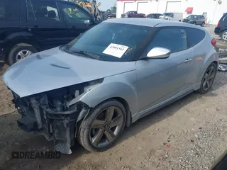 2013 Hyundai Veloster Turbo with VIN KMHTC6AE4DU157798, listed as a IAAI auction lot 42001561 with 163,370 mi miles and . Bid and sale history available at DreamBid. Image 2.