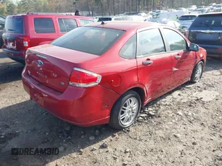 2009 Ford Focus SE with VIN 1FAHP35N89W188335, listed as a IAAI auction lot 41800622 with 164,176 mi miles. Bid and sale history available at carsss.com. Image 4.
