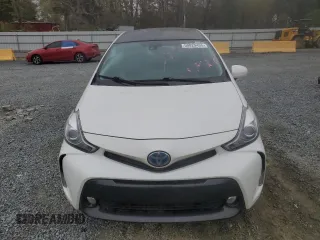 2016 Toyota Prius v Two with VIN JTDZN3EU9GJ048493, listed as a Copart auction lot 50825405 with 56,998 mi miles and Salvage Title. Bid and sale history available at carsss.com. Image 5.