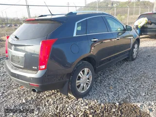 2014 Cadillac SRX Luxury Collection with VIN 3GYFNEE32ES610813, listed as a IAAI auction lot 42098401 with 112,000 mi miles. Bid and sale history available at carsss.com. Image 4.