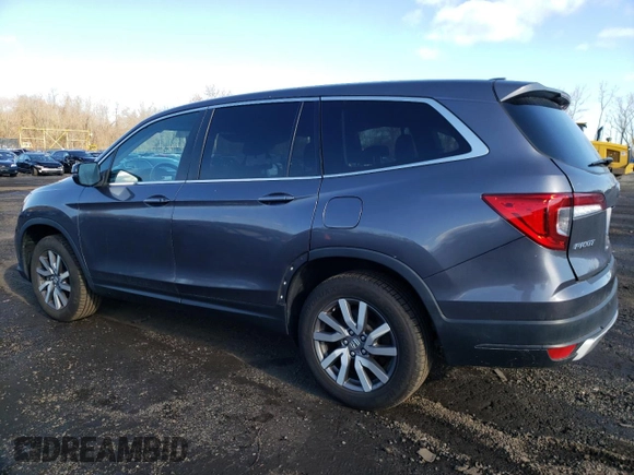 2022 Honda Pilot EX-L with VIN 5FNYF6H55NB023156, listed as a Copart auction lot 52269325 with 43,563 mi miles and Salvage title. Bid and sale history available at DreamBid. Image 2.