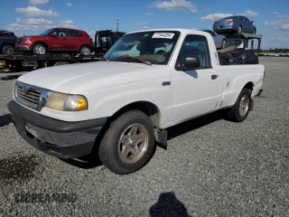 1999 Mazda B-Series 2WD Truck SX with VIN 4F4YR12C4XTM40289, listed as a Copart auction lot 77544354 with 192,046 mi miles and Salvage Title. Bid and sale history available at carsss.com. Image 1.