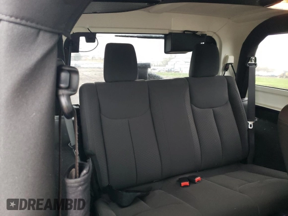 2017 Jeep Wrangler Willys Wheeler with VIN 1C4AJWAG0HL641188, listed as a Copart auction lot 52814005 with 94,959 mi miles and Salvage Title. Bid and sale history available at DreamBid. Image 10.