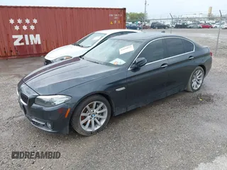 2015 BMW 5 Series 535i xDrive with VIN WBA5B3C59FD545279, listed as a IAAI auction lot 41810032 with 122,936 mi miles. Bid and sale history available at carsss.com. Image 2.