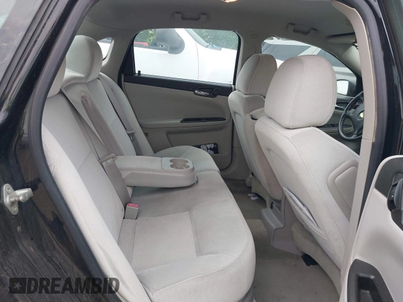 2013 Chevrolet Impala LT with VIN 2G1WB5E30D1202571, listed as a IAAI auction lot 41946958 with 104,291 mi miles and . Bid and sale history available at DreamBid. Image 8.