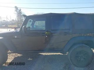 2016 Jeep Wrangler Unlimited Sport with VIN 1C4BJWDG0GL123581, listed as a IAAI auction lot 41426577 with 102,301 mi miles and . Bid and sale history available at DreamBid. Image 14.