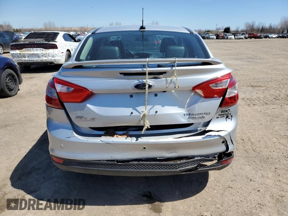 2013 Ford Focus Titanium with VIN 1FADP3J24DL327770, listed as a Copart auction lot 47582605 with 140,710 mi miles and Salvage Title. Bid and sale history available at carsss.com. Image 6.