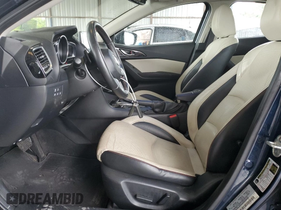 2015 Mazda 3 S Grand Touring with VIN JM1BM1M30F1259579, listed as a Copart auction lot 58244985 with 113,823 mi miles and Salvage title. Bid and sale history available at DreamBid. Image 7.