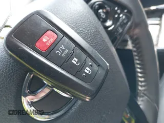2021 Toyota Prius LE with VIN JTDKAMFP7M3180504, listed as a IAAI auction lot 41985409 with 56,617 mi miles and . Bid and sale history available at DreamBid. Image 11.