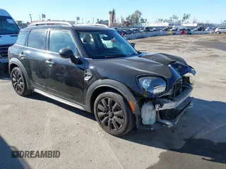 2019 MINI Countryman Cooper with VIN WMZYS7C56K3J05107, listed as a IAAI auction lot 41331512 with 64,089 mi miles. Bid and sale history available at carsss.com. Image 1.
