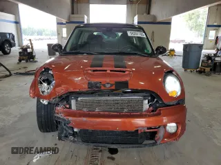 2013 MINI Hardtop S with VIN WMWSV3C52DT396176, listed as a Copart auction lot 59207165 with 104,194 mi miles and Salvage title. Bid and sale history available at DreamBid. Image 5.