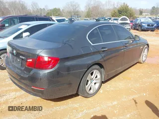 2013 BMW 5 Series 528i with VIN WBAXG5C52DD230018, listed as a IAAI auction lot 41726652 with 85,481 mi miles and . Bid and sale history available at carsss.com. Image 4.