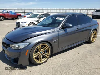 2015 BMW M3 with VIN WBS3C9C57FP806264, listed as a Copart auction lot 49001273 with 68,640 mi miles. Bid and sale history available at carsss.com. Image 1.