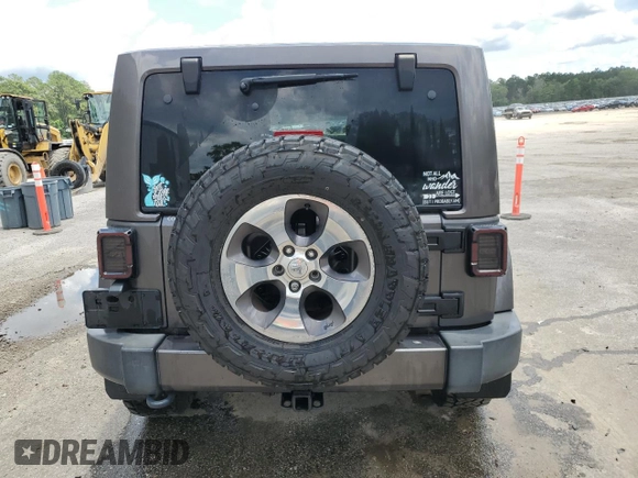 2016 Jeep Wrangler Unlimited Sahara с VIN 1C4BJWEG5GL221827, выставлен на аукционе Copart как лот 60411625 с пробегом 65 405 миль миль и Списание • Salvage title. История ставок и продаж доступна на DreamBid. Изображение 6.
