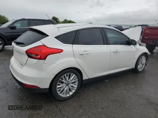 2017 Ford Focus Titanium с VIN 1FADP3N23HL244301, выставлен на аукционе Copart как лот 56625555 с пробегом 96 304 миль миль и Списание • Salvage title. История ставок и продаж доступна на DreamBid. Изображение 3.