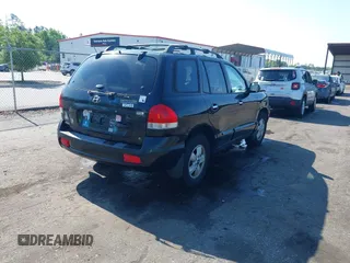 2006 Hyundai Santa Fe GLS with VIN KM8SC73EX6U047906, listed as a IAAI auction lot 42013780 with 200,828 mi miles. Bid and sale history available at carsss.com. Image 4.