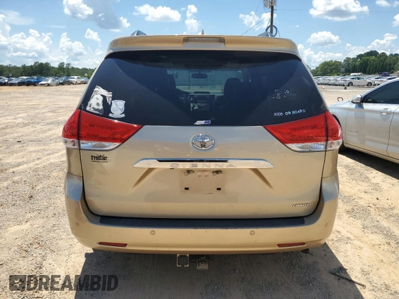 2014 Toyota Sienna XLE with VIN 5TDYK3DC8ES414814, listed as a Copart auction lot 64577875 with 111,675 mi miles and Salvage title. Bid and sale history available at DreamBid. Image 6.