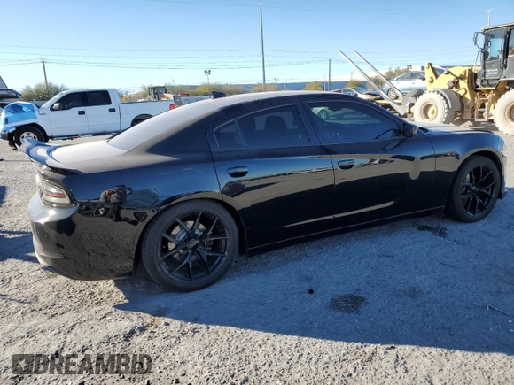 2015 Dodge Charger SXT with VIN 2C3CDXHG8FH769883, listed as a Copart auction lot 87723825 with 81,859 mi miles and Salvage Title. Bid and sale history available at DreamBid. Image 3.
