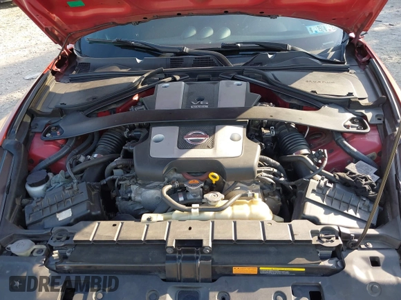 2014 Nissan 370Z Nismo with VIN JN1AZ4EH9EM636340, listed as a IAAI auction lot 42112548 with 143,894 mi miles and . Bid and sale history available at DreamBid. Image 10.