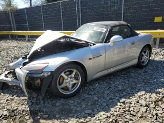 2002 Honda S2000 with VIN JHMAP11412T003822, listed as a Copart auction lot 48801985 with 122,850 mi miles and Salvage Title. Bid and sale history available at DreamBid. Image 1.