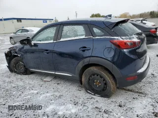2018 Mazda CX-3 Grand Touring z VIN JM1DKFD73J0309811, wystawiony jako Copart lot #50003315 z przebiegiem 135 365 mil mil oraz Czysty tytuł • Clean title. Historia ofert i sprzedaży dostępna na DreamBid. Obrazek 2.