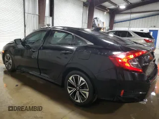 2017 Honda Civic EX-T with VIN 2HGFC1F34HH659846, listed as a Copart auction lot 48987095 with 96,300 mi miles and Salvage Title. Bid and sale history available at carsss.com. Image 2.