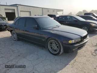 2001 BMW 7 Series 740iA with VIN WBAGG83421DN85338, listed as a Copart auction lot 71231314 with 185,234 mi miles and Salvage Title. Bid and sale history available at carsss.com. Image 4.
