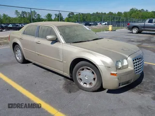 2007 Chrysler 300 Touring z VIN 2C3LA53GX7H693816, wystawiony jako IAAI lot #42062255 z przebiegiem 312 971 mil mil oraz . Historia ofert i sprzedaży dostępna na DreamBid. Obrazek 1.