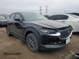 2023 Mazda CX-30 S with VIN 3MVDMBAM6PM549095, listed as a Copart auction lot 53027665 with 53,804 mi miles and Salvage title. Bid and sale history available at DreamBid. Image 4.