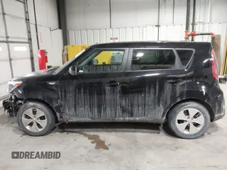2014 Kia Soul with VIN KNDJN2A21E7032469, listed as a IAAI auction lot 41595983 with 87,651 mi miles. Bid and sale history available at carsss.com. Image 14.