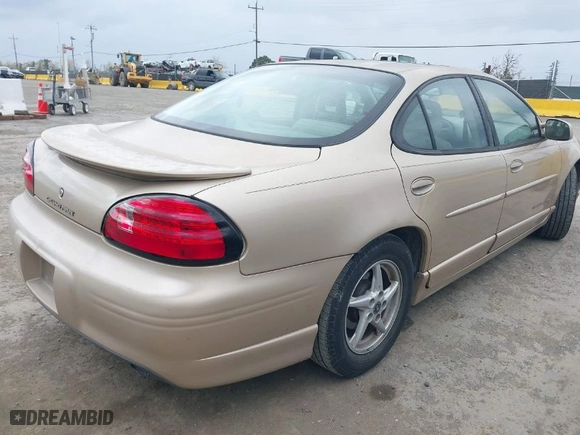 2003 Pontiac Grand Prix GT with VIN 1G2WP52K83F166466, listed as a IAAI auction lot 41932633 with 216,677 mi miles. Bid and sale history available at carsss.com. Image 4.