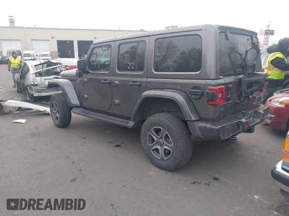 2021 Jeep Wrangler Unlimited Sahara z VIN 1C4JJXP68MW745098, wystawiony jako IAAI lot #41461092 z przebiegiem 36 410 mil mil oraz . Historia ofert i sprzedaży dostępna na DreamBid. Obrazek 3.