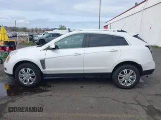 2016 Cadillac SRX Luxury Collection z VIN 3GYFNBE33GS507014, wystawiony jako IAAI lot #41979980 z przebiegiem 115 077 mil mil oraz . Historia ofert i sprzedaży dostępna na DreamBid. Obrazek 15.
