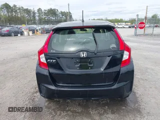 2016 Honda Fit LX with VIN JHMGK5H5XGX019435, listed as a IAAI auction lot 42009756 with 71,757 mi miles and . Bid and sale history available at DreamBid. Image 16.
