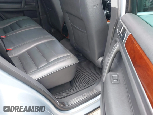 2007 Volkswagen Touareg V6 z VIN WVGZE77L37D001840, wystawiony jako IAAI lot #42323795 z przebiegiem 176 486 mil mil oraz . Historia ofert i sprzedaży dostępna na DreamBid. Obrazek 8.