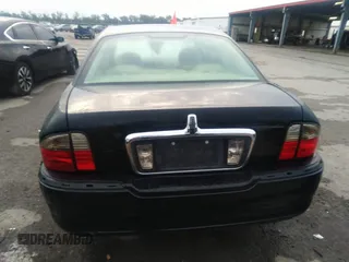 2005 Lincoln LS w/Luxury Pkg with VIN 1LNHM86S85Y606813, listed as a IAAI auction lot 39938974 with 131,558 mi miles. Bid and sale history available at carsss.com. Image 16.