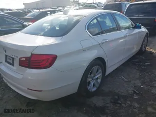 2012 BMW 5 Series 528i xDrive with VIN WBAXH5C57CDW06059, listed as a IAAI auction lot 41402225 with 167,656 mi miles. Bid and sale history available at carsss.com. Image 4.