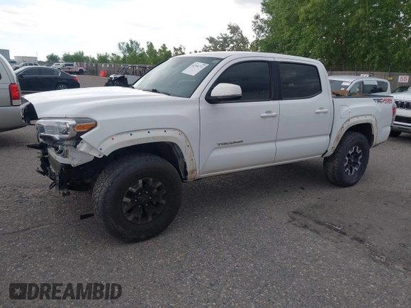 2020 Toyota Tacoma SR5 z VIN 5TFCZ5AN5LX242708, wystawiony jako IAAI lot #42356772 z przebiegiem 65 442 mil mil oraz . Historia ofert i sprzedaży dostępna na DreamBid. Obrazek 14.