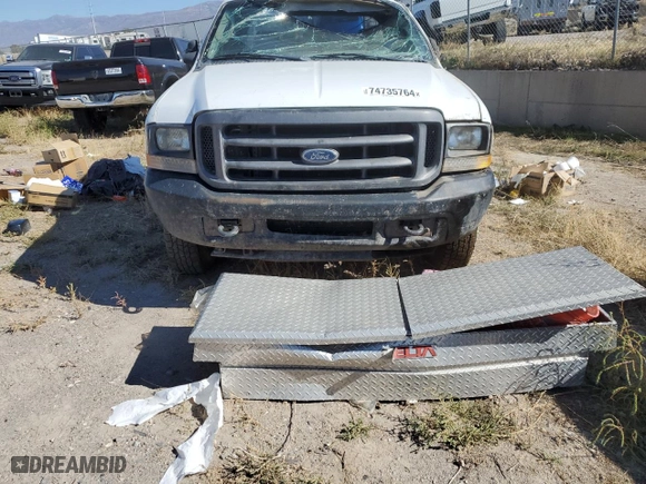 2004 Ford Super Duty F-350 DRW XL with VIN 1FTWX33P24ED26939, listed as a Copart auction lot 74735764 with 260,184 mi miles and Salvage Title. Bid and sale history available at carsss.com. Image 5.
