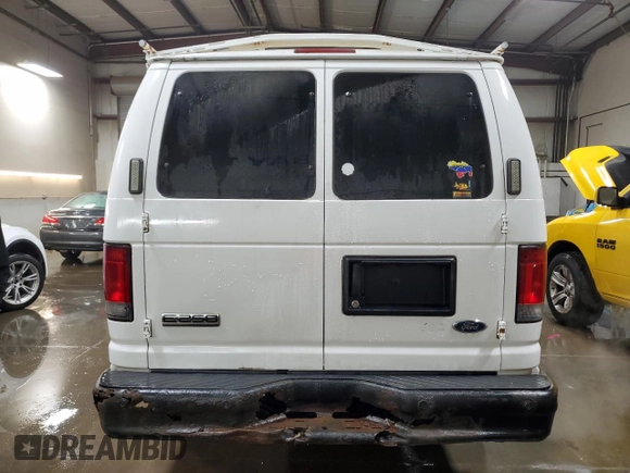 2011 Ford Econoline Cargo Commercial with VIN 1FTNE2EL6BDA70944, listed as a Copart auction lot 82169554 with 181,882 mi miles and Salvage title. Bid and sale history available at DreamBid. Image 6.