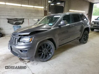 2018 Jeep Grand Cherokee Laredo with VIN 1C4RJFAGXJC487078, listed as a Copart auction lot 63752115 with 69,126 mi miles and Salvage title. Bid and sale history available at DreamBid. Image 1.